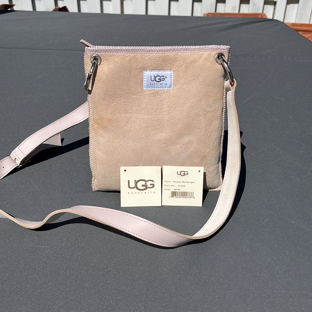 Ugg Australian suede pocket messenger with sheepskin lining beautiful pink color